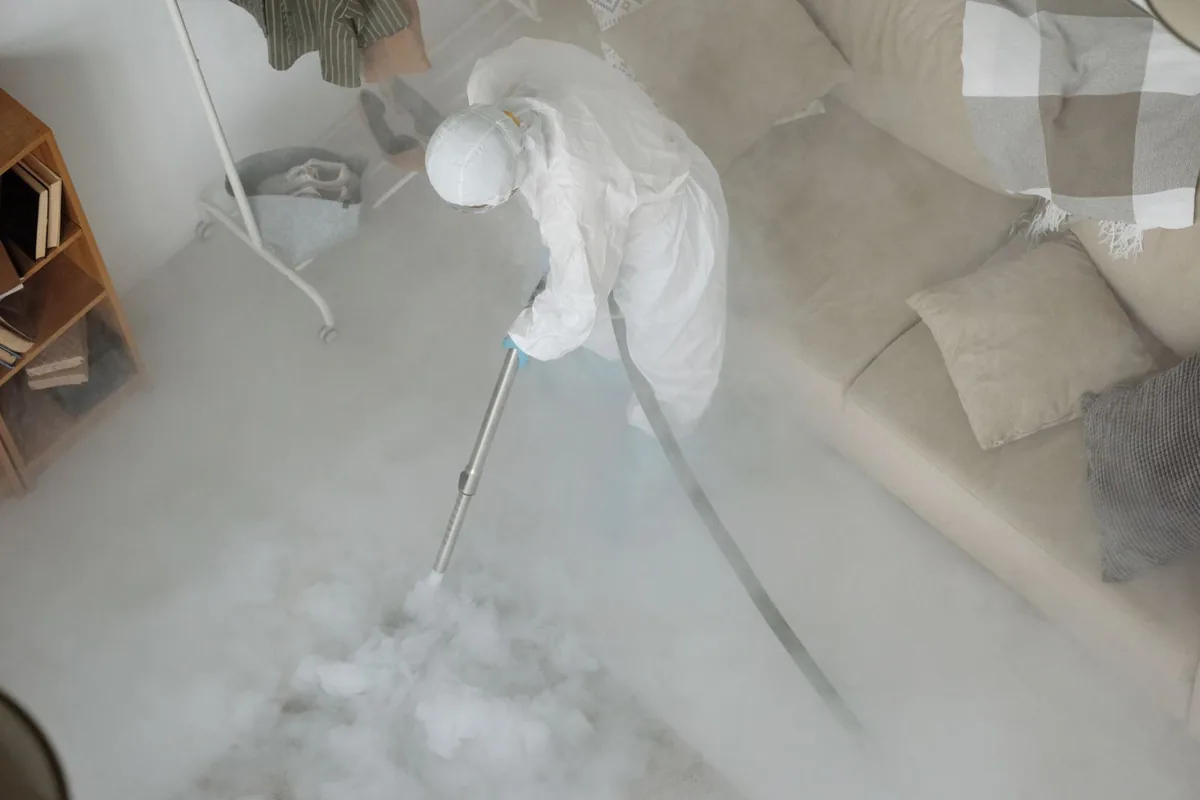 Biohazard cleanup technician in protective equipment, Weber City, VA